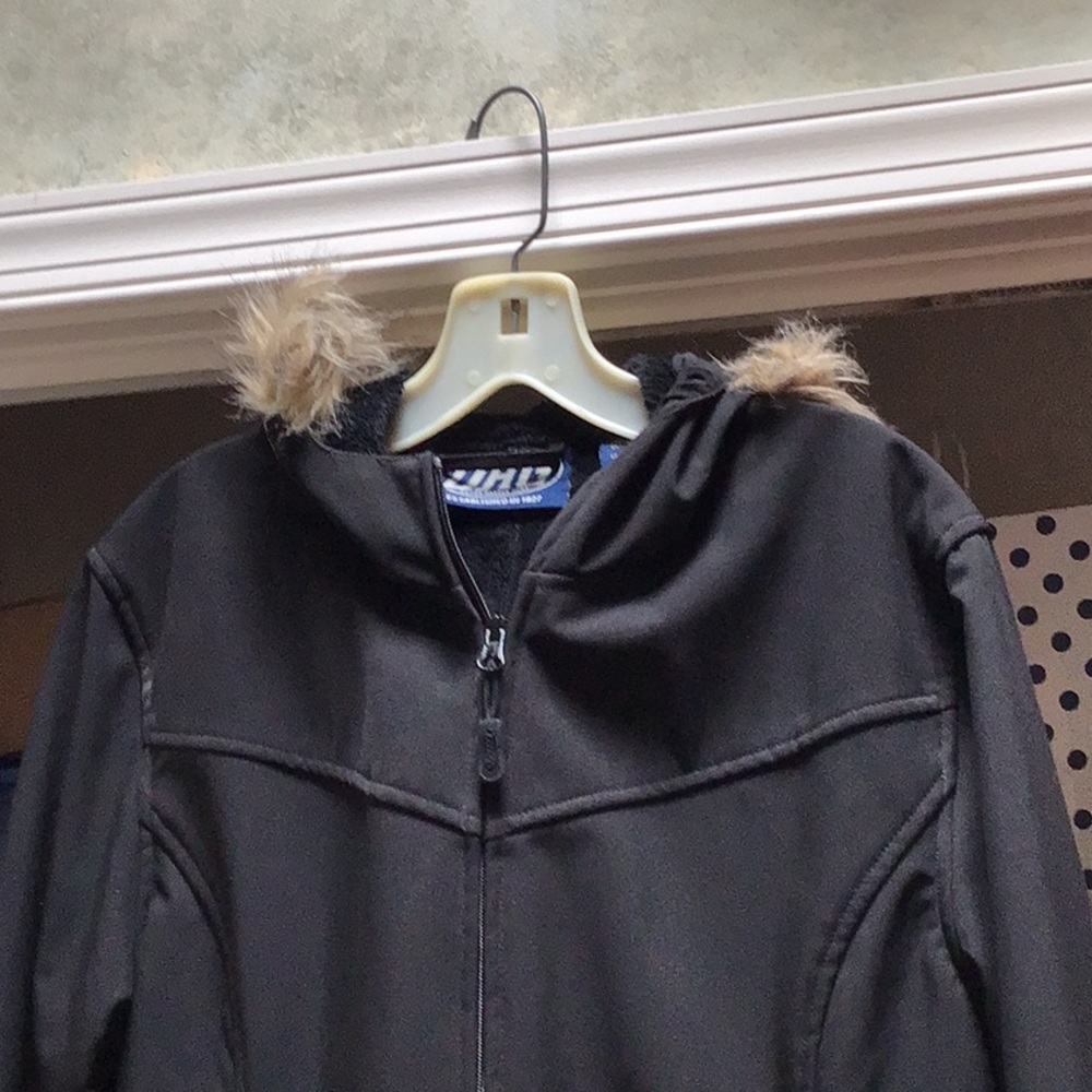 DHG lightweight black with fur trimmed hood.